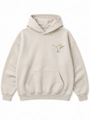Front view of the Coastal Study light stone DTG print hoodie with a small coastal bird illustration at the chest
