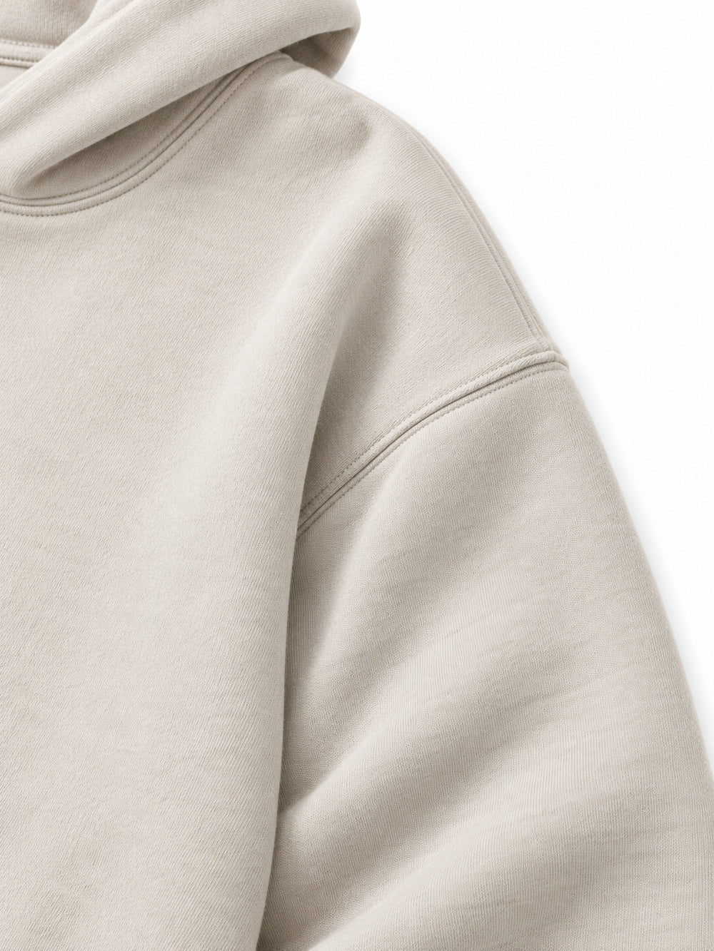 Close-up of the sleeve of the Coastal Study light stone DTG print hoodie