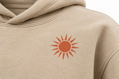 Close-up of the DTG print decoration on the Desert Echo sand DTG print boxy hoodie