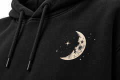 Close-up of the DTG print decoration on the Lunar Voyage black DTG print oversized hoodie