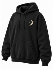 Front three-quarter view of the Lunar Voyage black DTG print oversized hoodie