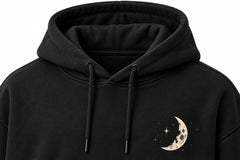 Close-up of the hood and neckline of the Lunar Voyage black DTG print oversized hoodie