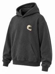 Front three-quarter view of the Midnight Ride charcoal DTG print boxy hoodie