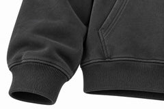 Close-up of the seam stitching of the Midnight Ride charcoal DTG print boxy hoodie