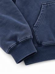 Close-up of the cuff and hem rib of the Moon Garden washed indigo DTG print oversized hoodie