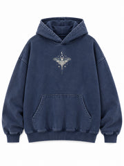 Front view of the Moon Garden washed indigo DTG print oversized hoodie with a small pale moth illustration at the chest