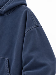 Close-up of the sleeve of the Moon Garden washed indigo DTG print oversized hoodie