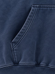 Close-up of the seam stitching of the Moon Garden washed indigo DTG print oversized hoodie