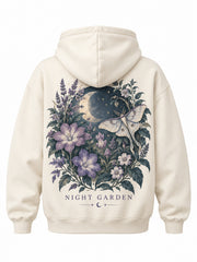 Back view of the Night Garden ivory DTG print oversized hoodie with detailed night-garden illustration with a moth, lavender, moon and teal foliage