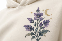 Close-up of the DTG print decoration on the Night Garden ivory DTG print oversized hoodie
