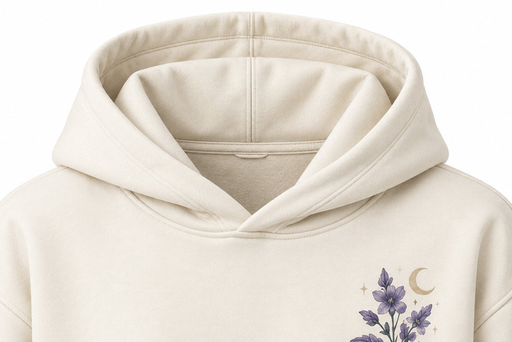 Close-up of the hood and neckline of the Night Garden ivory DTG print oversized hoodie