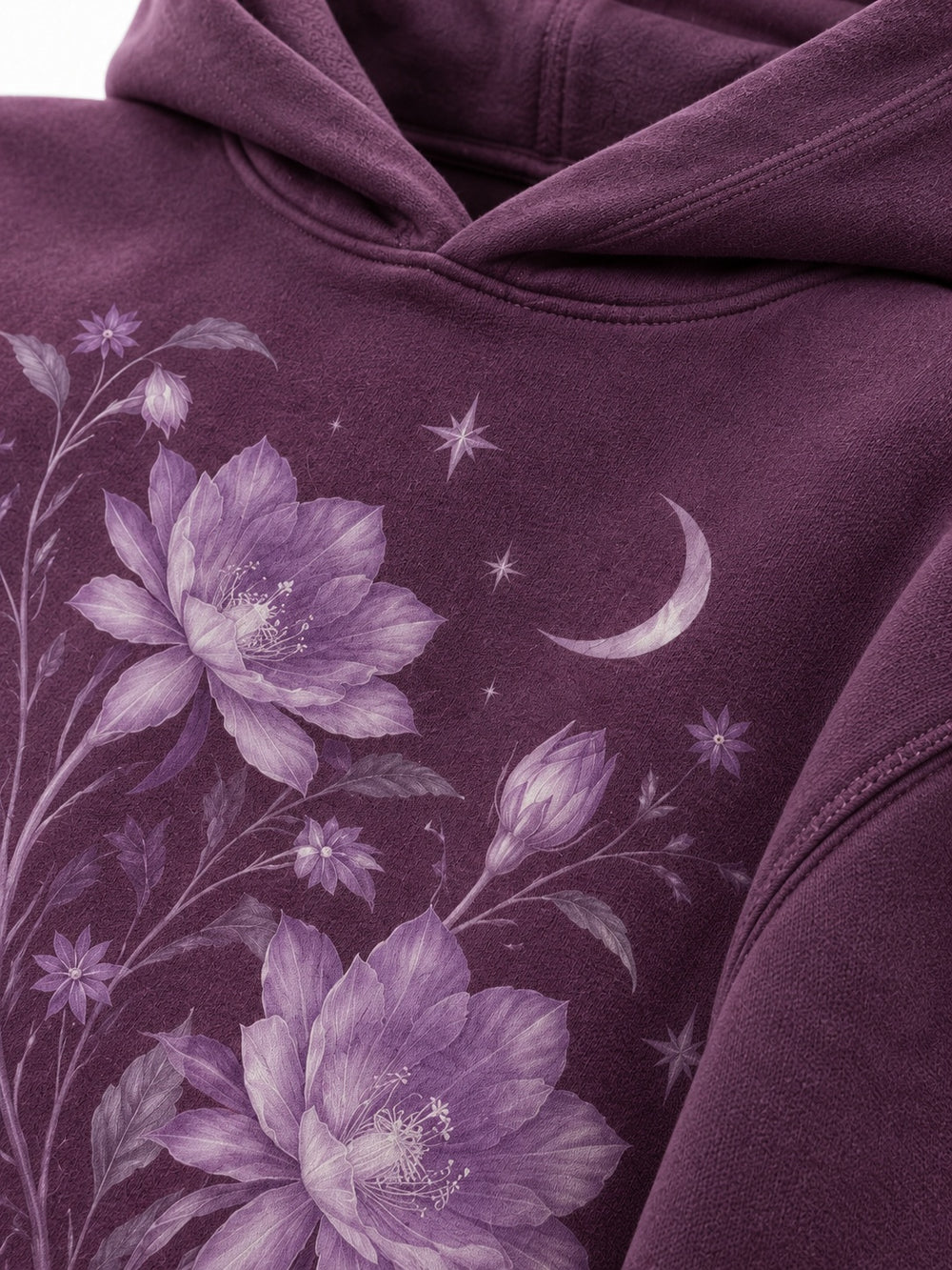 Close-up of the DTG print decoration on the Nocturne Flora plum DTG print boxy hoodie