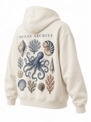 Rear three-quarter view of the Ocean Archive bone DTG print hoodie