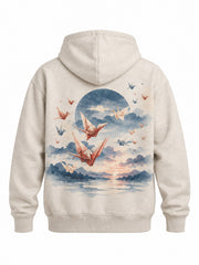 Back view of the Paper Crane oatmeal DTG print hoodie with flock of paper cranes over a muted indigo sunrise, captioned PAPER CRANE