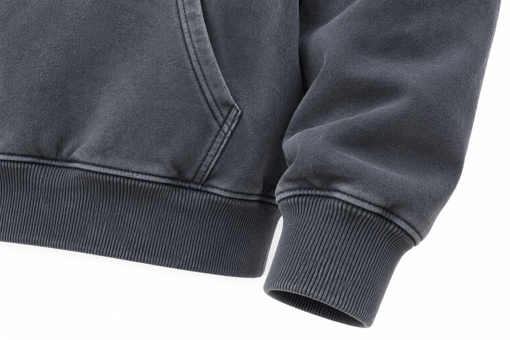 Close-up of the seam stitching of the Summit Dawn washed slate DTG print hoodie