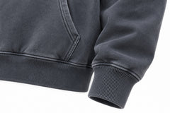Close-up of the seam stitching of the Summit Dawn washed slate DTG print hoodie