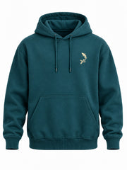 Front view of the Wild Current deep teal DTG print hoodie with tiny cream fish emblem