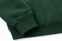 Close-up of the seam stitching of the Alpine Crest forest green embroidered hoodie