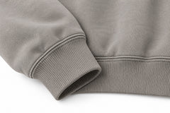Close-up of the seam stitching of the Contour Club stone gray embroidered oversized hoodie