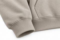 Close-up of the seam stitching of the Contour Half Zip stone embroidered boxy half-zip hoodie