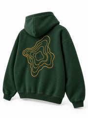 Rear three-quarter view of the Contour Stitch forest green embroidered boxy hoodie