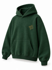 Front three-quarter view of the Contour Stitch forest green embroidered boxy hoodie