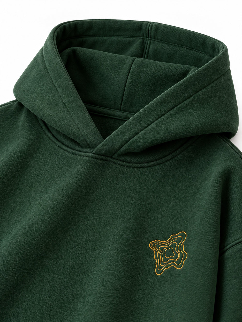 Close-up of the hood and neckline of the Contour Stitch forest green embroidered boxy hoodie
