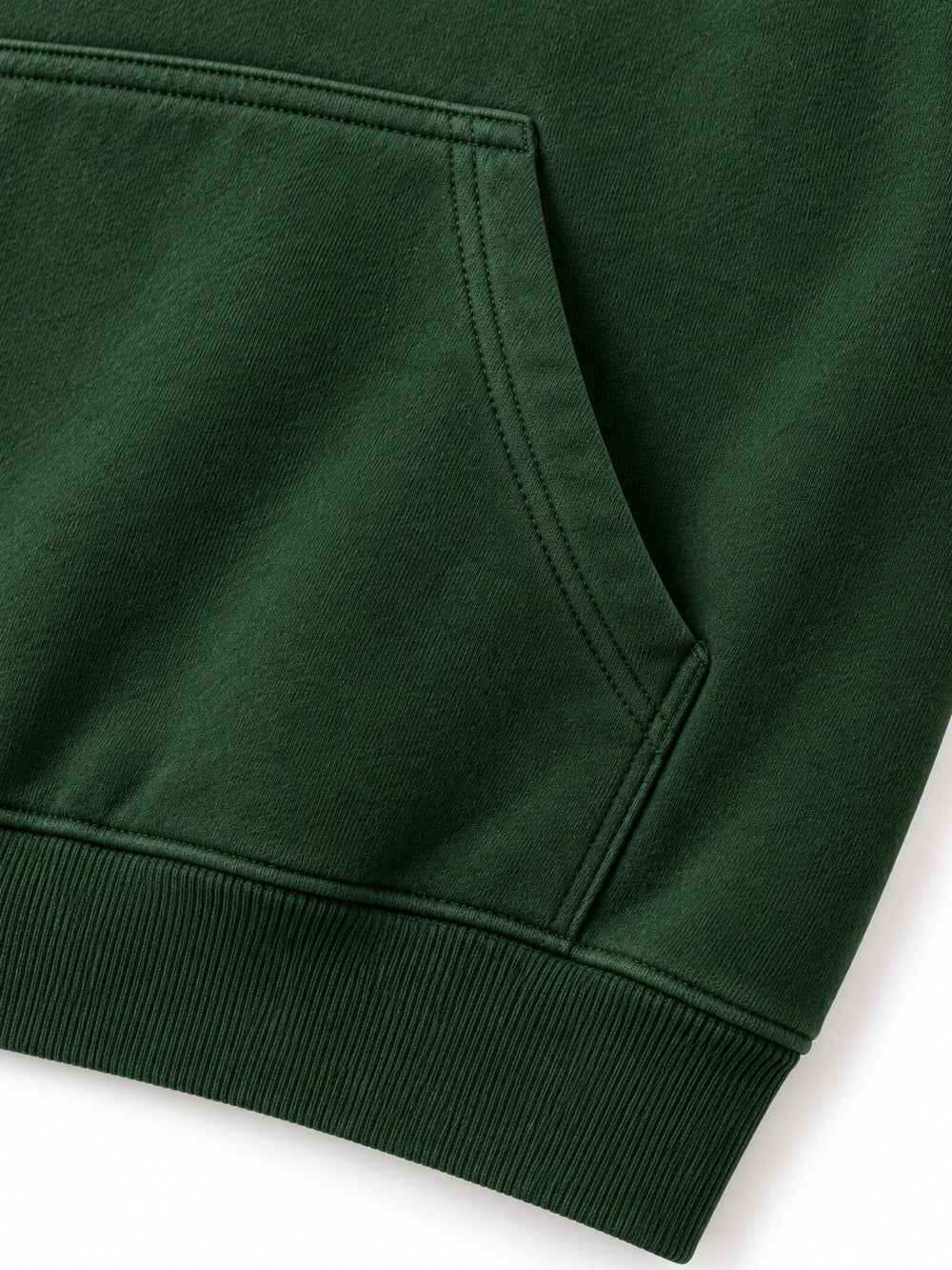 Close-up of the seam stitching of the Contour Stitch forest green embroidered boxy hoodie