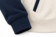 Close-up of the seam stitching of the Contrast Line ivory and navy embroidered zip-up hoodie