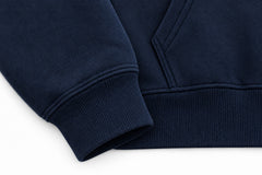 Close-up of the seam stitching of the Crescent Studio midnight navy embroidered boxy hoodie