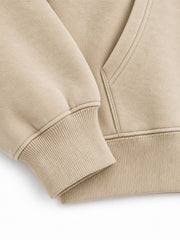 Close-up of the cuff and hem rib of the Desert Bloom sand embroidered zip-up hoodie