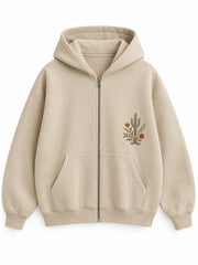 Front view of the Desert Bloom sand embroidered zip-up hoodie with a compact cactus and flower embroidery at the left pocket