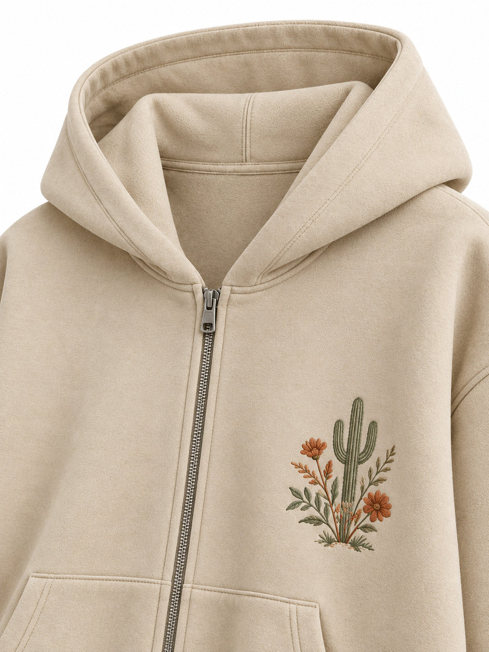 Close-up of the hood and neckline of the Desert Bloom sand embroidered zip-up hoodie