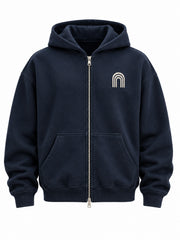 Front view of the Double Zip Arc navy embroidered boxy zip-up hoodie with cream embroidered arch emblem on the left chest