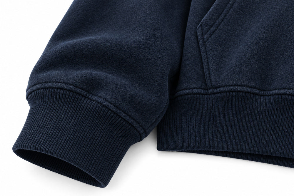 Close-up of the seam stitching of the Double Zip Arc navy embroidered boxy zip-up hoodie