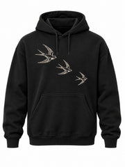 Front view of the Flight Line black embroidered hoodie with three cream outline swallows embroidered diagonally across the upper chest