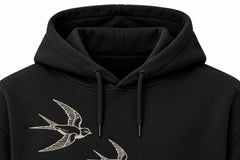 Close-up of the hood and neckline of the Flight Line black embroidered hoodie