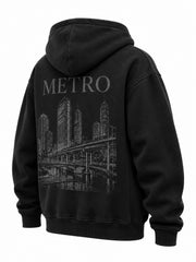 Rear three-quarter view of the Metro Zip black embroidered zip-up hoodie