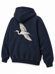 Rear three-quarter view of the Night Heron ink navy embroidered oversized hoodie