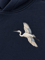 Close-up of the embroidered decoration on the Night Heron ink navy embroidered oversized hoodie