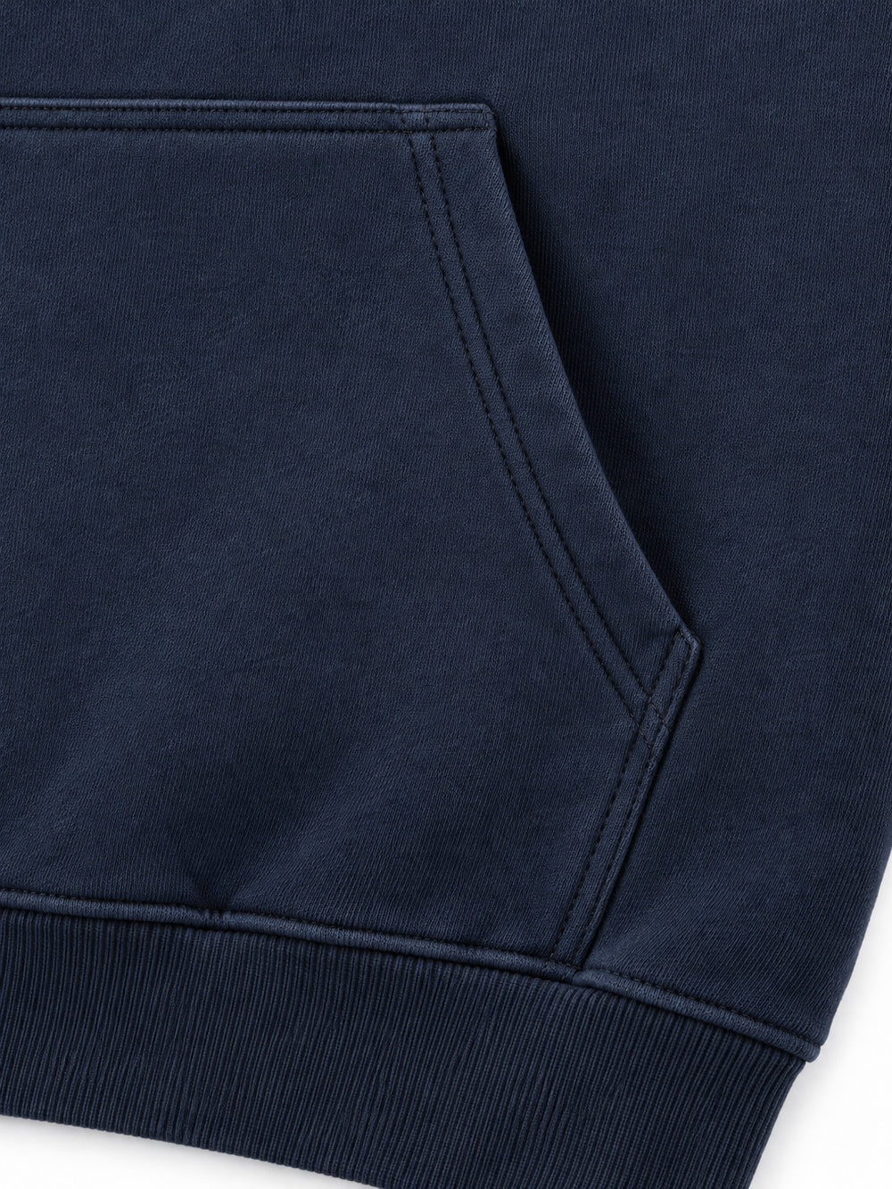 Close-up of the seam stitching of the Night Heron ink navy embroidered oversized hoodie