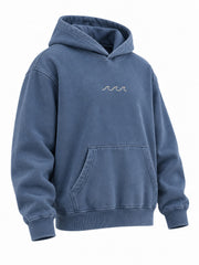 Front three-quarter view of the Ocean Mark washed blue embroidered hoodie
