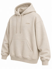 Front three-quarter view of the Quiet Form oatmeal embroidered oversized hoodie