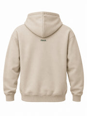 Back view of the Trail Compass warm sand embroidered hoodie with small forest green TRAIL embroidery below the hood