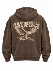 Back view of the Vintage Zip faded brown embroidered oversized zip-up hoodie with distressed one-color cream workshop eagle with WORKS lettering