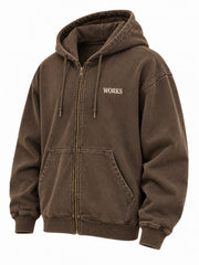 Front three-quarter view of the Vintage Zip faded brown embroidered oversized zip-up hoodie
