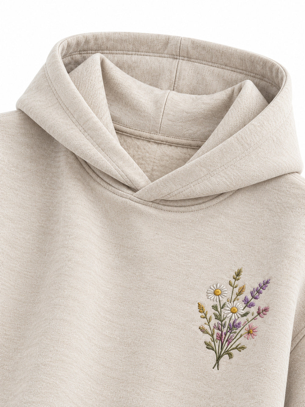 Close-up of the hood and neckline of the Wild Meadow oatmeal embroidered hoodie