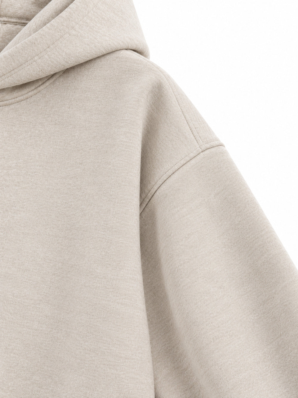 Close-up of the sleeve of the Wild Meadow oatmeal embroidered hoodie