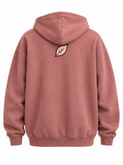 Back view of the Felt Bloom dusty rose felt appliqué hoodie with small cream felt leaf at the nape