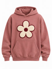 Front view of the Felt Bloom dusty rose felt appliqué hoodie with large cream felt five-petal flower with a burgundy satin-stitch border